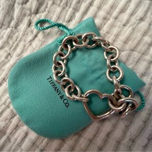 Tiffany and Co. link bracelet with heart shaped clasp.